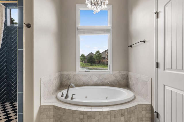 3260 W Rivulet Pass, Springfield, MO 65810 - full bathroom featuring a whirlpool tub, healthy amount of natural light, and a chandelier