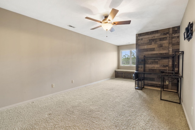 3260 W Rivulet Pass, Springfield, MO 65810 - carpeted living area featuring a ceiling fan and baseboards