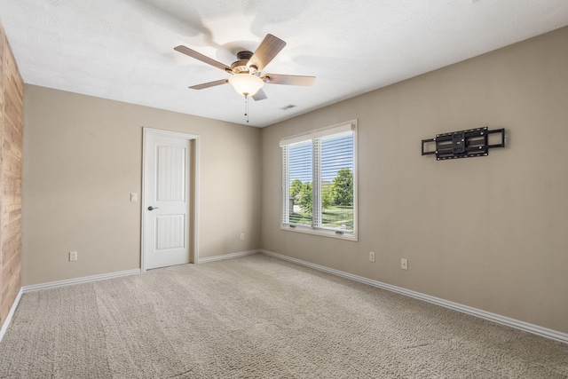 3260 W Rivulet Pass, Springfield, MO 65810 - spare room featuring ceiling fan, baseboards, and light carpet