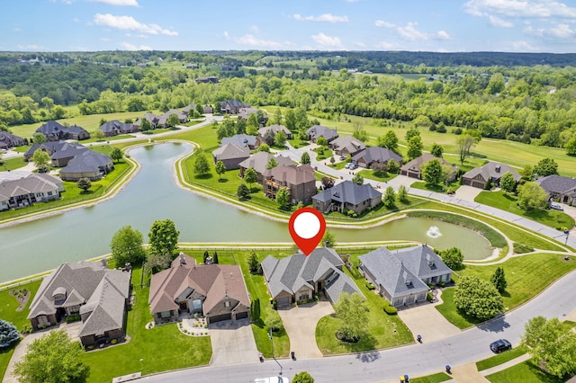 3260 W Rivulet Pass, Springfield, MO 65810 - aerial perspective of suburban area featuring a nearby body of water