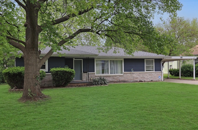 845 W Seminole St, Springfield, MO 65807 - view of front of house featuring stone siding, a front lawn, and a shingled roof