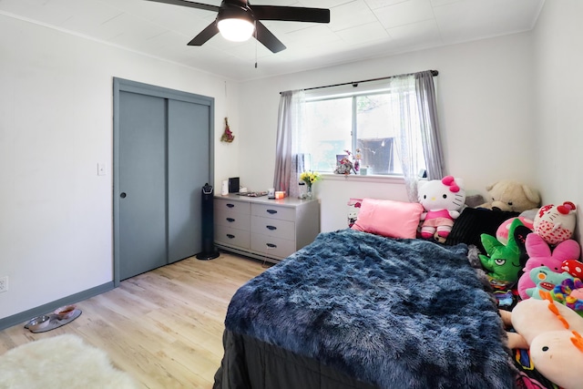 845 W Seminole St, Springfield, MO 65807 - bedroom with light wood-type flooring, a closet, and ceiling fan
