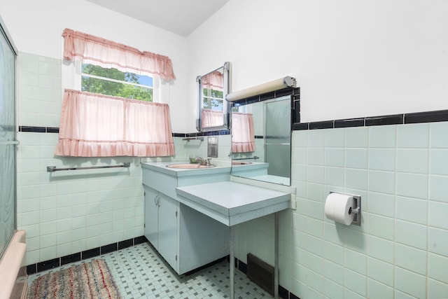 191 State Highway Y, Forsyth, MO 65653 - bathroom featuring tile walls, vanity, wainscoting, and tile patterned flooring