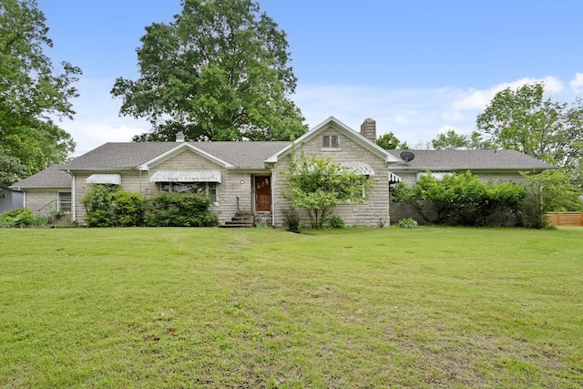 191 State Highway Y, Forsyth, MO 65653 - view of front facade with a chimney, a front yard, stone siding, and a shingled roof