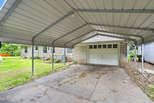 191 State Highway Y, Forsyth, MO 65653 - garage featuring a detached garage and cooling unit