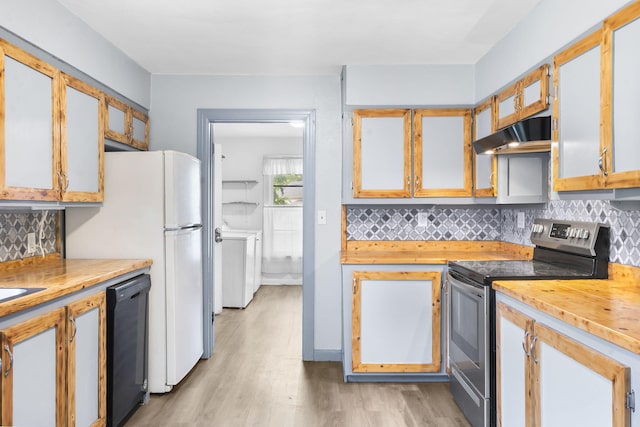 191 State Highway Y, Forsyth, MO 65653 - kitchen with stainless steel range with electric stovetop, under cabinet range hood, dishwasher, independent washer and dryer, and wooden counters