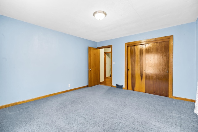 191 State Highway Y, Forsyth, MO 65653 - unfurnished bedroom featuring baseboards, carpet flooring, and a closet