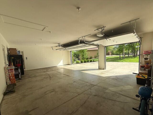 garage featuring a garage door opener