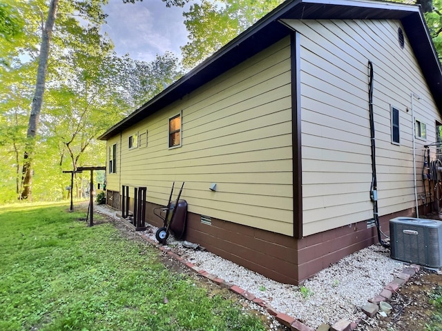 1424 Brown Rd, Van Buren, MO 63965 - view of property exterior featuring central AC unit, a yard, and crawl space