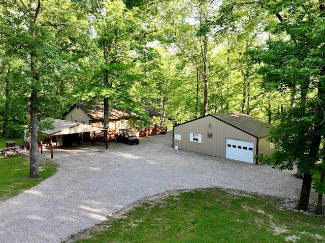 1424 Brown Rd, Van Buren, MO 63965 - view of front of home featuring a garage, an outbuilding, and driveway
