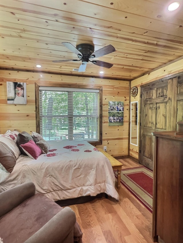 1424 Brown Rd, Van Buren, MO 63965 - bedroom featuring wood ceiling, wood walls, and light wood-style floors