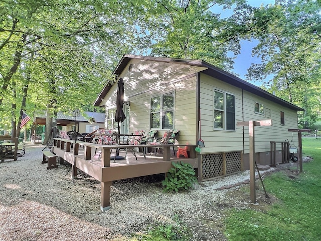 1424 Brown Rd, Van Buren, MO 63965 - back of house with a deck