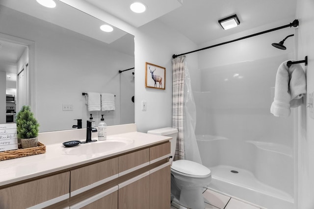 77 Anglers Pointe Unit 4, Branson, MO 65616 - bathroom featuring toilet, a stall shower, and vanity