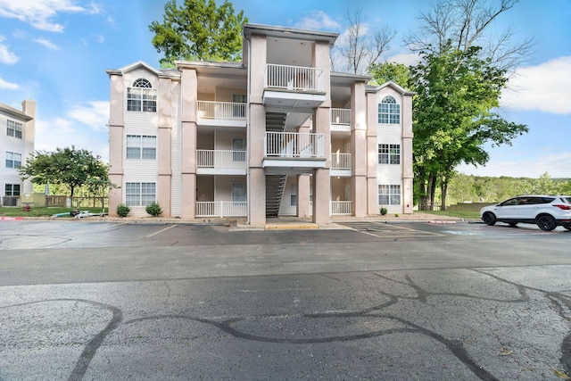77 Anglers Pointe Unit 4, Branson, MO 65616 - view of building exterior featuring uncovered parking