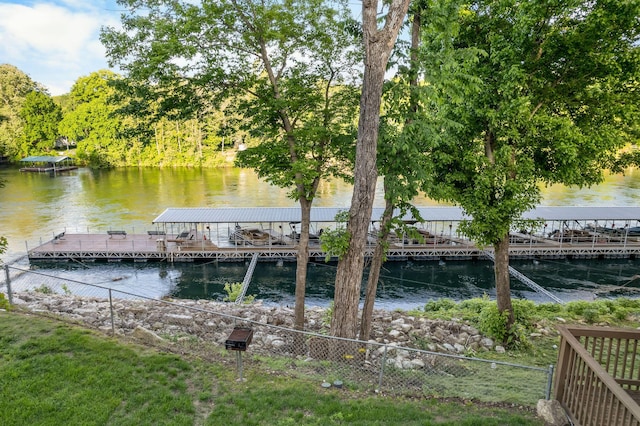 77 Anglers Pointe Unit 4, Branson, MO 65616 - dock area featuring a water view and fence