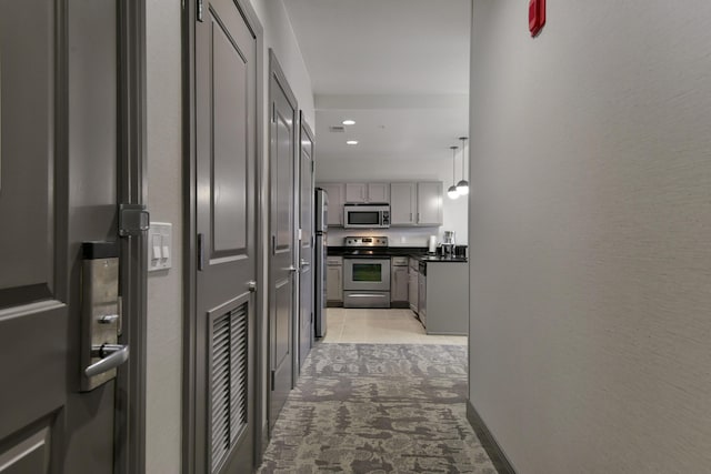 2312 Branson Landing Blvd Unit A, Branson, MO 65616 - hallway with light tile patterned floors and light colored carpet