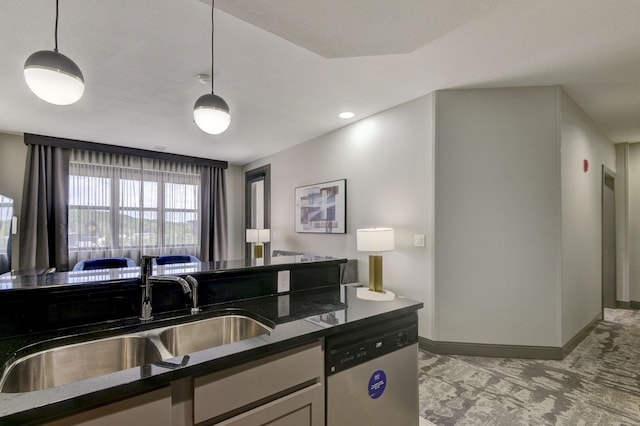 2312 Branson Landing Blvd Unit A, Branson, MO 65616 - kitchen featuring dishwasher, a sink, decorative light fixtures, light carpet, and baseboards