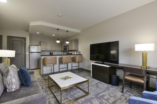 2312 Branson Landing Blvd Unit A, Branson, MO 65616 - living room with baseboards, recessed lighting, and light colored carpet