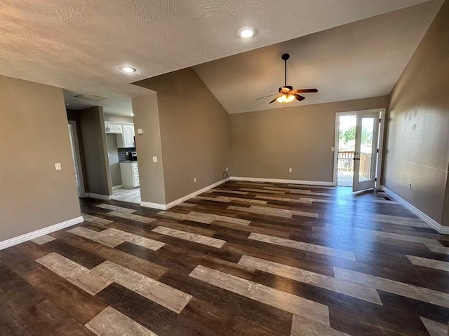 unfurnished living room featuring a ceiling fan, wood finished floors, baseboards, vaulted ceiling, and recessed lighting