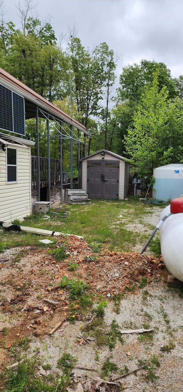 19879 Farm Rd Unit 1043, Exeter, MO 65647 - view of yard with a shed and an outbuilding