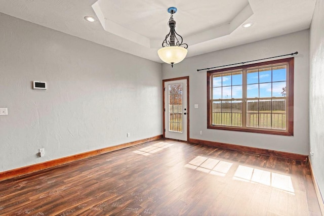 1602 E Fairwind, Ozark, MO 65721 - empty room featuring baseboards, wood finished floors, recessed lighting, and a raised ceiling