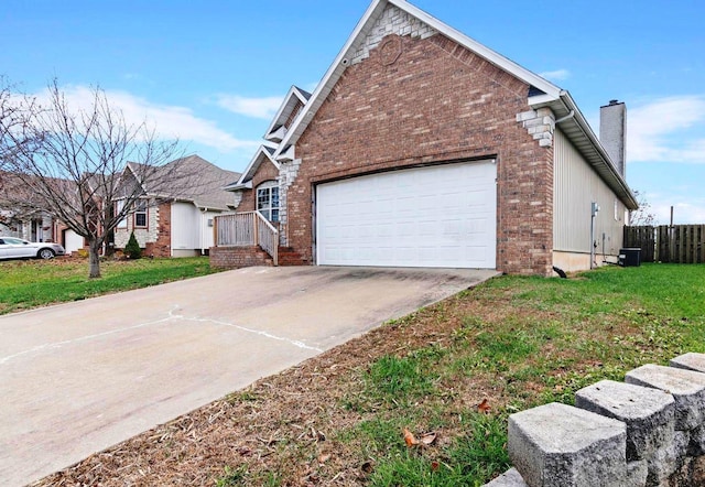 1602 E Fairwind, Ozark, MO 65721 - view of front of home featuring brick siding, driveway, a chimney, and a garage