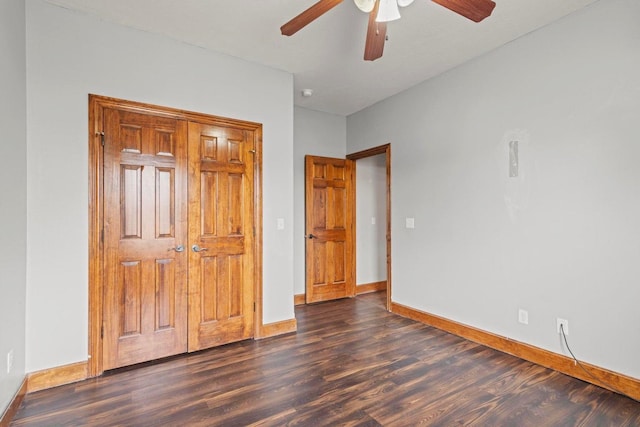 1602 E Fairwind, Ozark, MO 65721 - unfurnished bedroom featuring baseboards, wood finished floors, and ceiling fan