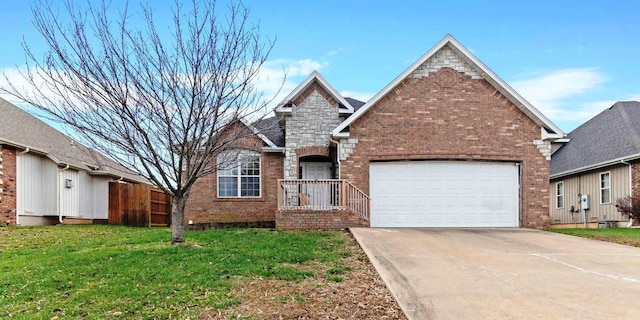 1602 E Fairwind, Ozark, MO 65721 - traditional-style home featuring concrete driveway, brick siding, and an attached garage