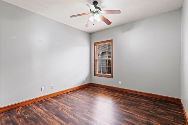 1602 E Fairwind, Ozark, MO 65721 - empty room with wood finished floors, baseboards, and ceiling fan
