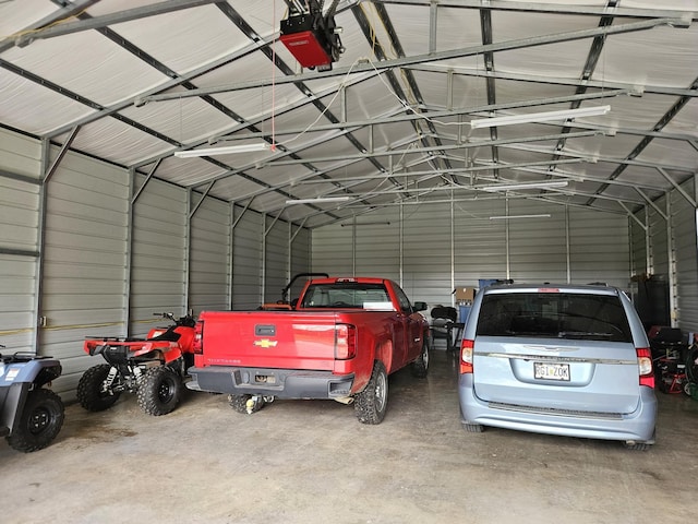 1100 County Road 8270, West Plains, MO 65775 - garage featuring a garage door opener and metal wall