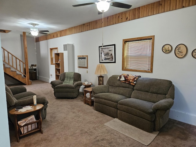 1100 County Road 8270, West Plains, MO 65775 - carpeted living room with a ceiling fan, stairs, and baseboards