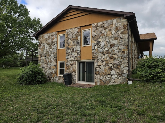 1100 County Road 8270, West Plains, MO 65775 - back of house featuring stone siding and a yard