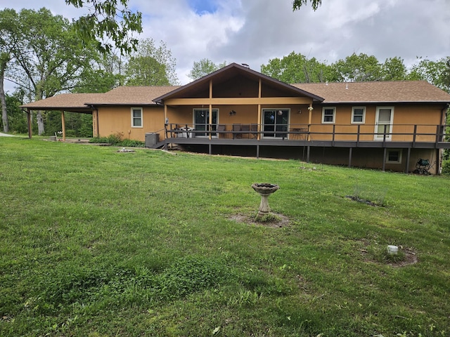 1100 County Road 8270, West Plains, MO 65775 - back of property featuring a lawn, central AC unit, and a deck