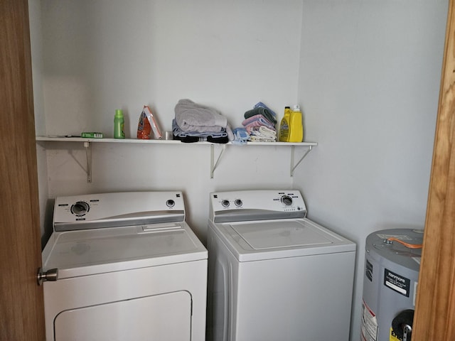 1100 County Road 8270, West Plains, MO 65775 - clothes washing area featuring washer and clothes dryer and water heater