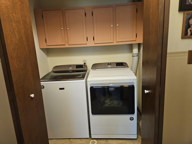 1100 County Road 8270, West Plains, MO 65775 - washroom with washing machine and dryer and cabinet space