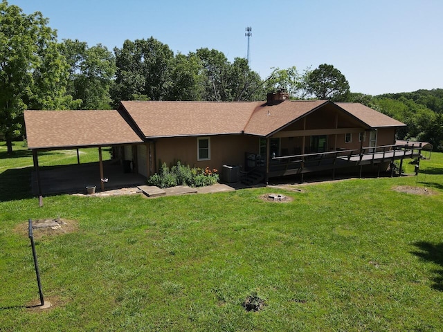 1100 County Road 8270, West Plains, MO 65775 - rear view of property with central air condition unit, a lawn, a chimney, and a shingled roof