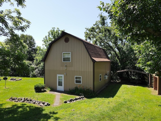 1100 County Road 8270, West Plains, MO 65775 - view of home's exterior with a gambrel roof, a yard, and a detached carport