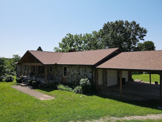 1100 County Road 8270, West Plains, MO 65775 - view of side of property with an attached garage, stone siding, a yard, and a shingled roof
