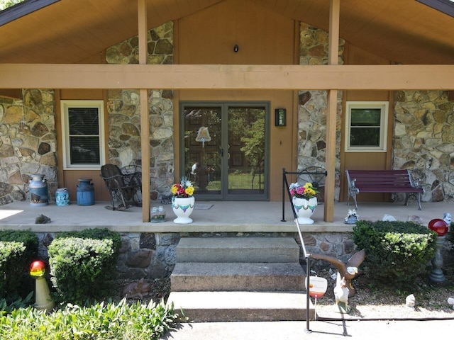 1100 County Road 8270, West Plains, MO 65775 - doorway to property with stone siding and french doors