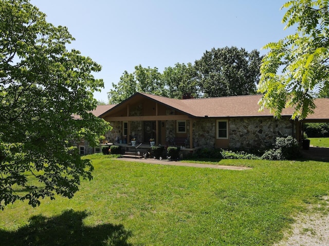 1100 County Road 8270, West Plains, MO 65775 - rear view of property with stone siding, a yard, and covered porch