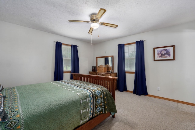 13860 Lawrence Unit 1158, Mount Vernon, MO 65712 - carpeted bedroom with multiple windows, baseboards, and ceiling fan