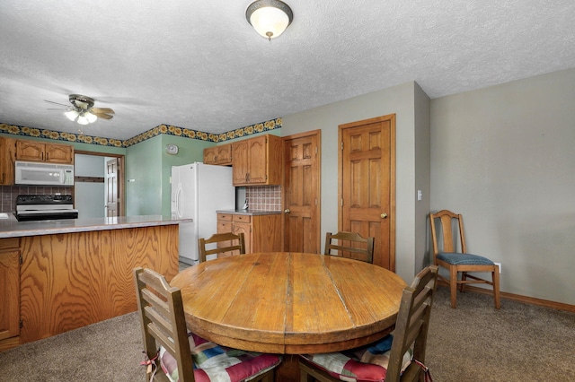 13860 Lawrence Unit 1158, Mount Vernon, MO 65712 - dining room with light colored carpet, a ceiling fan, baseboards, and a textured ceiling
