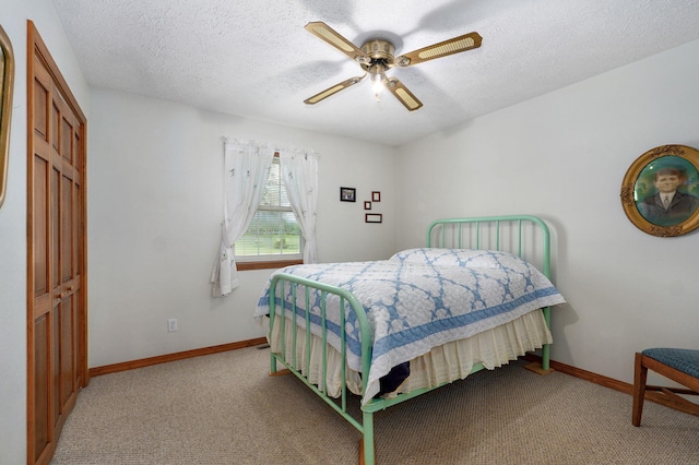 13860 Lawrence Unit 1158, Mount Vernon, MO 65712 - carpeted bedroom featuring a ceiling fan, baseboards, and a textured ceiling