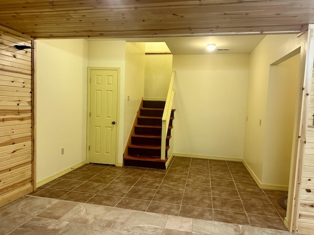 136 Riverview Dr, Mammoth Spring, AR 72554 - below grade area featuring stairway, wood ceiling, and baseboards
