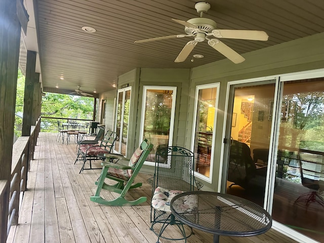 136 Riverview Dr, Mammoth Spring, AR 72554 - wooden deck with ceiling fan and a porch