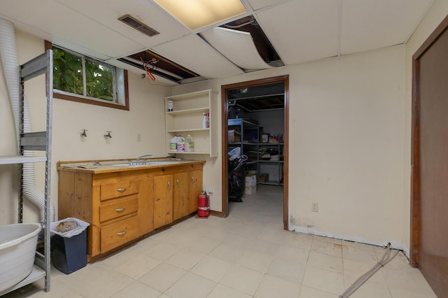 basement with a sink