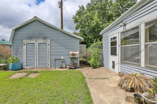 rear view of house with a yard
