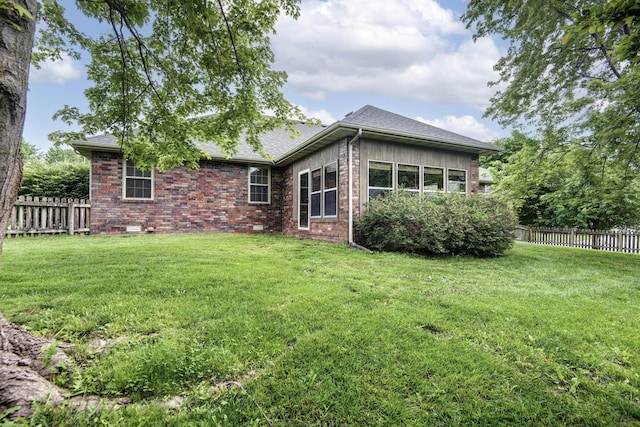 904 W Crater Cir, Nixa, MO 65714 - back of house featuring brick siding and roof with shingles