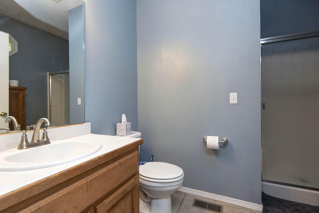 904 W Crater Cir, Nixa, MO 65714 - full bathroom featuring a stall shower, tile patterned floors, toilet, vanity, and baseboards