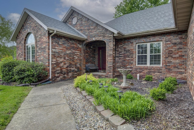 904 W Crater Cir, Nixa, MO 65714 - view of front facade featuring roof with shingles and brick siding